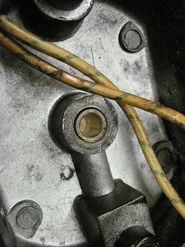 A closeup of the Alphasew's bronze bushing.